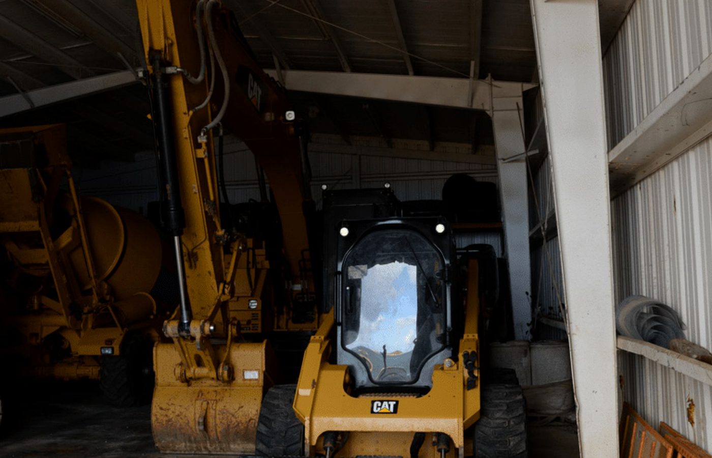 Skid steer loader for concrete flatwork preparation